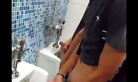 friends jacking off in the public bathroom