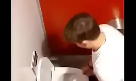 Spying guy jerking off in public restroom